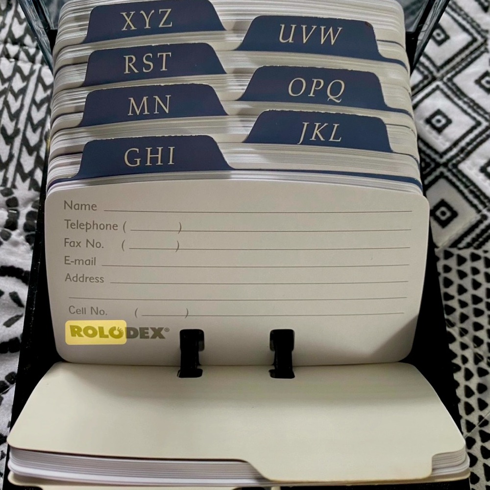 Rolodex phone number caddy. An extra 100 pages been added. $15.00 takes all.